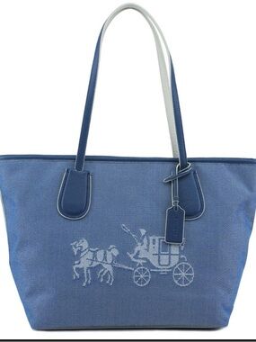 Coach Blue  Taxi Tote Bag featuring the iconic Horse and Carriage logo